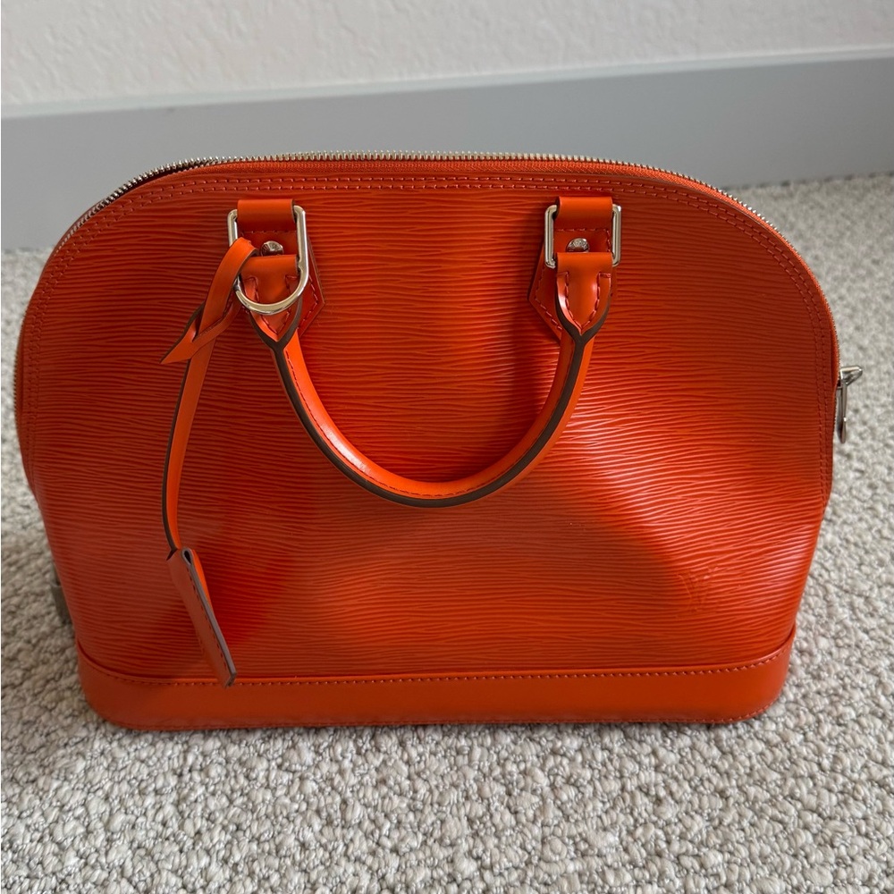 Louis Vuitton Orange Leather Handbag with Silver Hardware